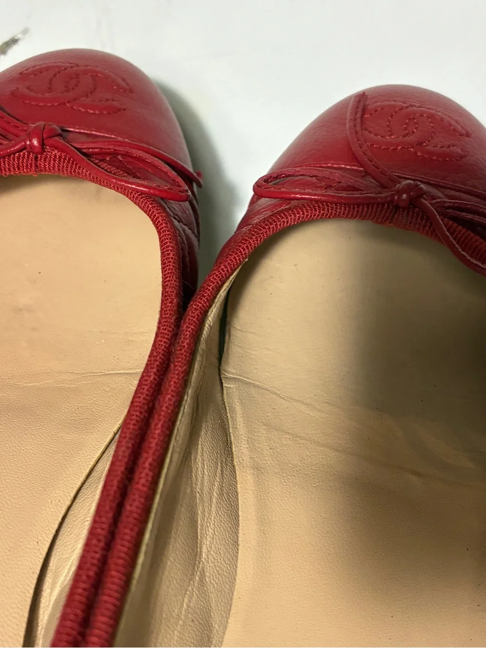 sold CHANEL Red Quilted Leather Ballet Flats with Bow and Embossed CC